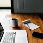 Laptop workspace representing an affiliate lead capture funnel and email follow-up system